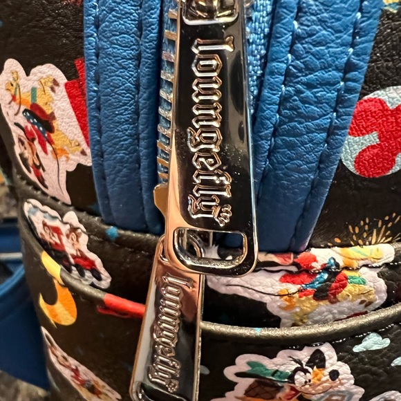 Loungefly Disney Parks Disneyland Ride all over Icon Mini Backpack NWT - Picture 2 of 8